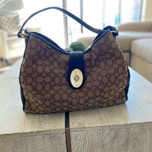 Authentic Coach signature shoulder bag.